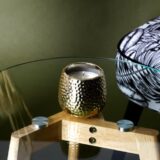 kaars in gouden pot